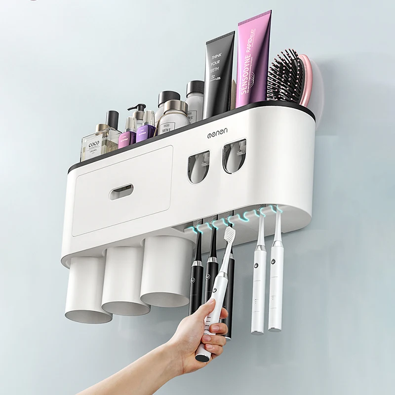 Close-up of the toothbrush holders on the Ultimate Bathroom Toothbrush Organizer, showing different types of toothbrushes
