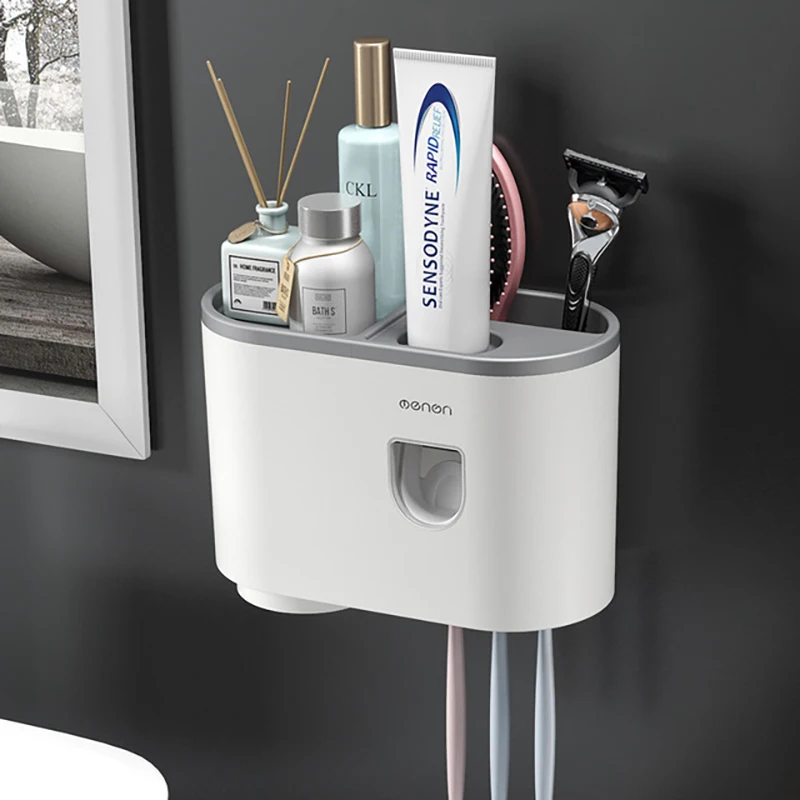 A child using the Ultimate Bathroom Toothbrush Organizer to dispense toothpaste