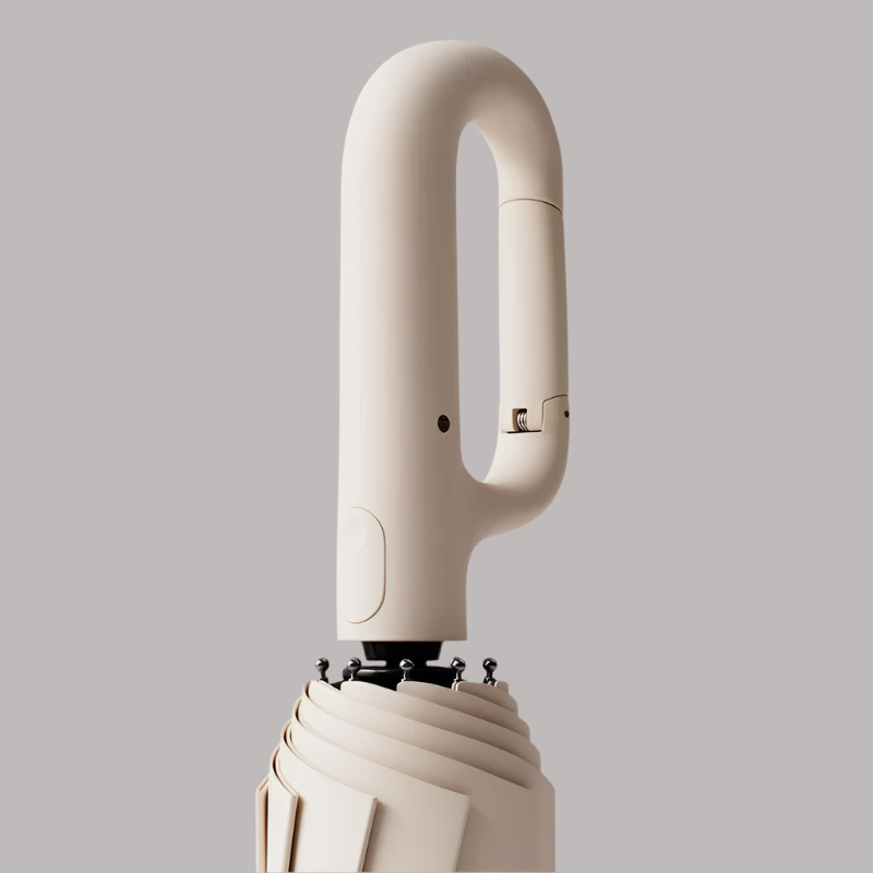 Close-up of the umbrella handle, showcasing its ergonomic design and ring-buckle detail